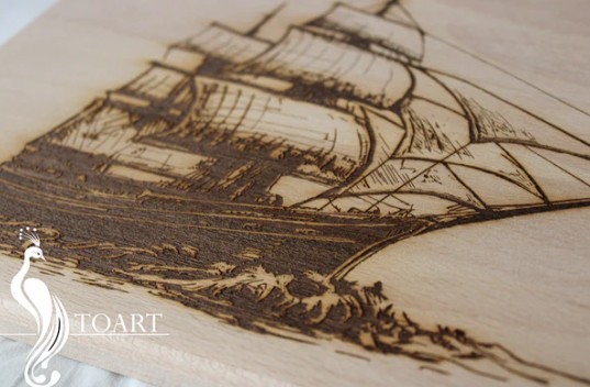 Engraved sailboat